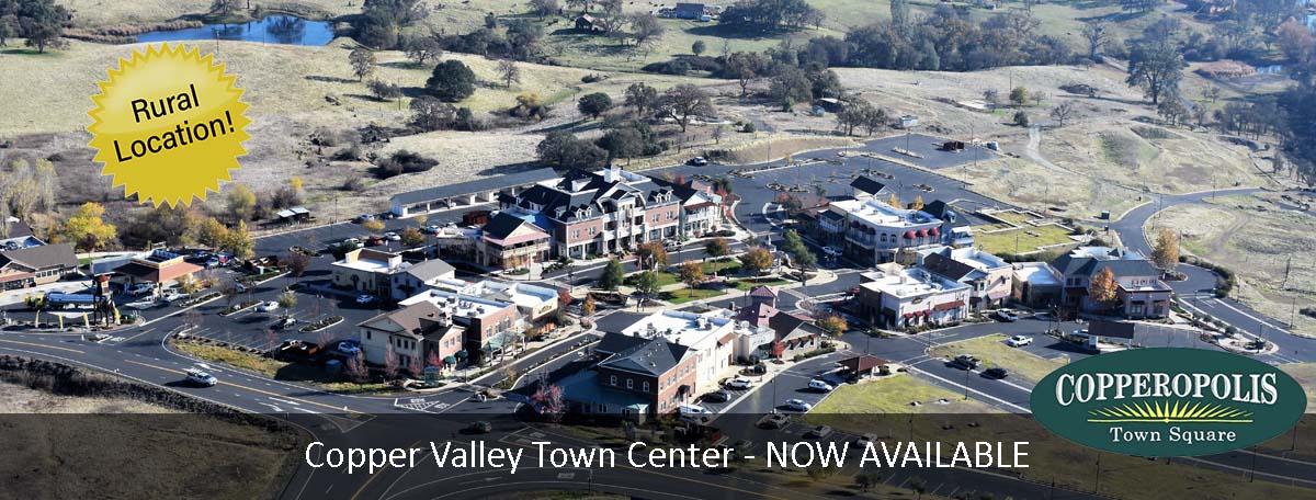 Photo of Copper Valley Town Center set in rural area.  Text on photo says Copper Valley Town Center - NOW AVAILABE.
