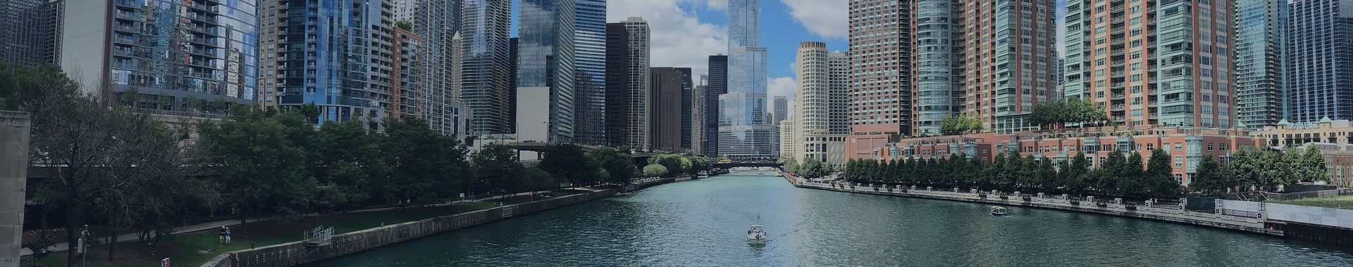 Photo of downtown Chicago and river flowing through it.