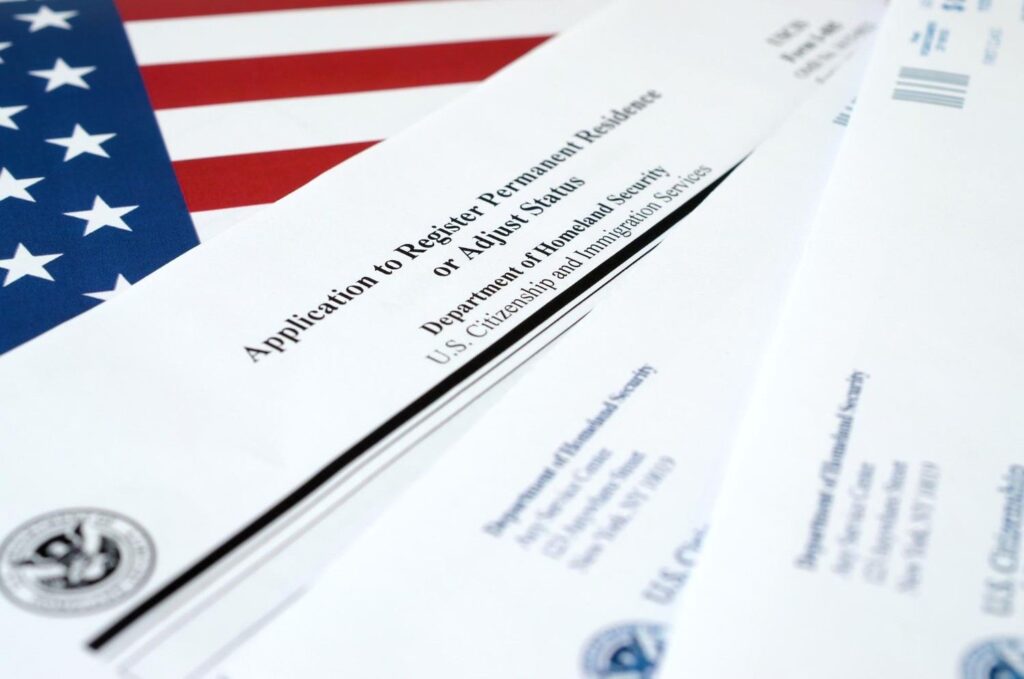 On August 18, 2026, USCIS issued updated guidance explaining how it will apply the public charge ground of inadmissibility to applicants seeking permanent residency. The guidance accompanies a final rule published July 20, 2026 — effective September 18, 2026 — that rescinds the 2022 Biden-era public charge regulations. If you’re on an H-1B, F-1, or similar visa and adjusting status through EB-5, this is worth understanding before you file your Form I-485. The short version: EB-5 investors are subject to the public charge determination, but the profile of a qualifying EB-5 investor — substantial documented assets, no dependence on government benefits — aligns well with what USCIS is looking for. The rule creates a more consequential issue for some derivative beneficiaries than for investors themselves. What Is the Public Charge Ground of Inadmissibility? The public charge ground of inadmissibility bars USCIS from approving a Green Card application if the officer determines the applicant is likely — at any point in the future — to become financially dependent on the U.S. government through means-tested public benefits. It’s a long-standing provision of the Immigration and Nationality Act, but what it covers has shifted significantly with each administration. The 2022 Biden rule narrowed the analysis considerably — limiting it primarily to cash assistance for income maintenance and long-term institutionalization. The new rule reverses that narrowing and broadens the benefits USCIS can consider. That change takes effect September 18, 2026. Does This Apply to EB-5 Investors? Yes. USCIS’s updated guidance explicitly lists Investors — the EB-5 employment-based preference category — among the groups subject to the public charge analysis when filing for adjustment of status. That means an I-485 filed by an EB-5 investor will include a public charge review by the adjudicating officer. The analysis, however, is not binary. USCIS must consider the totality of the applicant’s circumstances across five statutory factors: age, health, family status, assets and financial resources, and education and skills. No single factor is automatically disqualifying, and no single factor creates automatic approval. The officer is weighing the full picture. For most EB-5 investors, that full picture works in their favor. An investor who has committed $800,000 or more in documented, lawfully sourced capital — and who has already cleared the source-of-funds analysis required by their immigration attorney to file an I-526E — is presenting exactly the financial profile the public charge factors reward: substantial assets, documented income history, demonstrated financial self-sufficiency. What Actually Changed Under the New Rule The substantive change is in which public benefits USCIS will consider — and the cutoff date matters. For benefits received before September 18, 2026: USCIS will only consider receipt of cash assistance for income maintenance and long-term institutionalization at government expense. This is the same narrow standard that has been in place under the 2022 rule. For benefits received on or after September 18, 2026: USCIS can consider any and all means-tested public benefits — including housing assistance, food assistance (SNAP), Medicaid, and similar programs — when evaluating your application going forward. The practical implication: benefits received before September 18 carry limited weight in the analysis. Benefits received after that date — even while your I-485 is pending — are now within USCIS’s scope. This is the provision that matters most for investors and their families who are currently in the middle of the adjustment process. The Derivative Beneficiary Issue Where this rule has the most practical relevance for EB-5 families is with derivative beneficiaries — spouses and children included on the investor’s I-485 application. In many cases, a spouse on an F-2 or H-4 visa or a child on F-1 may have received limited public benefits, particularly in the healthcare category, that the investor themselves never touched. Under the 2022 rule, many of those benefits would have been outside the scope of the analysis. Under the new rule, benefits received on or after September 18, 2026 are reviewable. Each derivative beneficiary’s circumstances are evaluated independently, and the totality-of-circumstances standard means a USCIS officer will weigh those benefits against the financial picture of the entire family unit — but the benefits are on the record. The answer isn’t necessarily a problem; it may be easily explained in the context of a family with substantial assets and a documented investment. But it needs to be identified, disclosed accurately, and addressed thoughtfully in the application — not discovered during adjudication. Public Charge Bonds: The Safety Valve The updated guidance also clarifies the public charge bond process. If a USCIS officer determines that an I-485 applicant is inadmissible solely on public charge grounds, the officer may invite the applicant to post a financial bond — either a cash bond or a surety bond submitted via Form I-945 — as an assurance of future self-sufficiency. If the bond is accepted and properly posted, the application can still be approved. The bond amount is calculated based on government assistance the applicant may be eligible for over the next five years. Applicants can only submit Form I-945 if USCIS extends an invitation via a Notice of Intent to Deny — it cannot be preemptively filed. For the vast majority of financially capable EB-5 investors, the bond mechanism will never come into play. But it exists, and it’s worth knowing about before a Notice of Intent to Deny becomes the first time you hear of it. What Changes on September 18, 2026 This guidance takes effect September 18, 2026, and applies to all Forms I-485 postmarked or electronically submitted on or after that date. Applications already pending before that date are not affected by the new guidance. For investors who have already filed their I-485 — or who will file before September 18 — the 2022 standard remains the operative one. For investors whose I-526E is still pending and who plan to file I-485 once a visa number becomes available, this rule will be in effect at the time of that filing. That doesn’t change the fundamental analysis for a financially qualified investor, but it does make accurate benefit disclosure and documentation more important than it was under the 2022 framework. Key Takeaways EB-5 investors are subject to the public charge ground of inadmissibility when filing Form I-485 to adjust status. This has always been true; the new rule changes what USCIS considers in making that determination. The public charge analysis is totality-of-circumstances — five statutory factors including financial resources and assets. The financial profile of a qualified EB-5 investor is generally well-aligned with what USCIS is looking for. For benefits received before September 18, 2026: only cash assistance and long-term institutionalization are considered. For benefits received on or after that date: any means-tested benefit is within scope. Derivative beneficiaries — spouses and children on the same I-485 — deserve independent review. Benefits one family member received may not be on the investor’s radar but could appear in the application record. The public charge bond process exists as a safety valve for applicants whose applications are affected solely by public charge concerns — but it can only be used after USCIS issues an invitation via a Notice of Intent to Deny. Applications filed before September 18, 2026 operate under the 2022 standard. Applications filed on or after that date fall under the new guidance. What to Do Now For investors already in the U.S. on an H-1B or similar visa who are at or approaching the I-485 stage, the most important step is a straightforward review with your immigration attorney of any public benefits received by you or anyone on your application — particularly any received after September 18, 2026. The goal is accurate disclosure and context, not avoidance. USCIS officers review these determinations case by case, and a well-documented record is the strongest position to be in. Disclaimer: This update is provided for informational purposes only and does not constitute legal or investment advice. Visa availability is subject to change, and individual circumstances may vary. Prospective investors should consult with qualified immigration counsel and review all offering documents before making any investment decision.